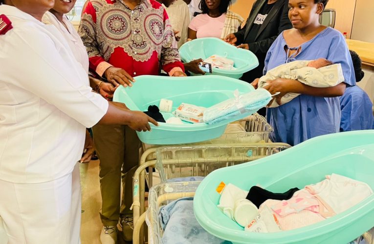 Mayor showers Christmas babies with gifts